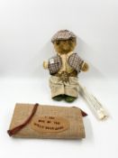 A handmade 'Welly Bear Gang' teddy bear by Laura Grand with a certificate of authenticity and a