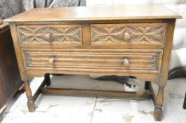 A mid 20th century Ipswich oak side cabinet in the Jacobean style. H.73 W.106 D.45cm