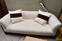 A contemporary calico upholstered sofa. W.205cm
