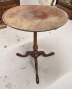 A 19th century mahogany tilt top occasional table. H.62 D.58cm