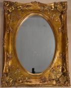A contemporary 19th century style gilt wall mirror. H.128 W.97 D.13cm