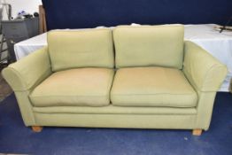 A contemporary two seater sofa. H.95 W.191 D.93cm