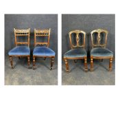 A pair of 19th century walnut dining chairs along with a similar pair.
