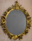 A contemporary 19th century style carved giltwood wall mirror. H.108 W.80