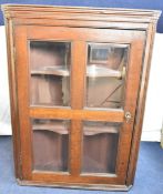Corner cabinet, 19th century oak with bevelled glass panels. H.96 W.71 D.38cm
