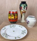 A Moorcroft vase, two Poole Pottery vases and a 19th century Mintons Cornflower plate. H.28cm