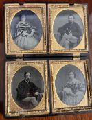 Four Daguerreotype portraits presented in a single hinged case. Open H.15 W.12 D.2cm.