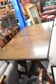 A mid century Younger extending dining table fitted with integral leaf. L.158cm