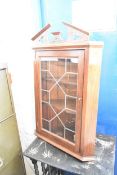 A Georgian style corner cabinet. H.98cm
