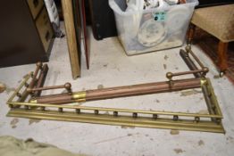 Two 19th century brass fire kerbs. Largest W.130cm
