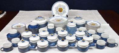 An extensive Denby Chatsworth dinner service to include ten dinner plates and eighteen side plates