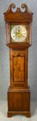 A Georgian oak and mahogany longcase clock with eight day movement and brass and steel dial.