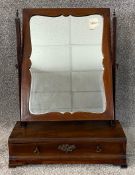 A 19th century mahogany swing toilet mirror. H.59 W.44 D.19cm