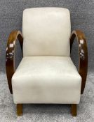 An Art Deco walnut framed armchair in faux leather upholstery. H.84 W.65 D.81cm