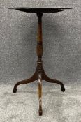A 19th century mahogany lamp or occasional table on tripod base. H.69 Dia.3cm