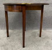 A Georgian mahogany tea table with foldover top and gateleg action. H.71 W.84 D.87cm