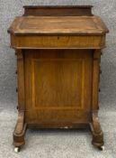 A Victorian walnut Davenport with satinwood inlay. H.82 W.55 D.52cm