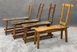 Four vintage donkey bench artist's easels. Three pine and one beech, one with Winsor and Newton