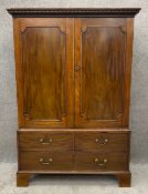 A 19th century mahogany linen press fitted with hanging rail. H.185 W.126 D.62cm