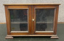 A 19th century walnut table top display cabinet. H.30 W.45 D.32cm