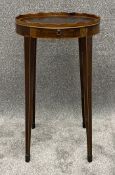A George III mahogany lamp stand with satinwood inlay fitted with candle slide. H.66cm