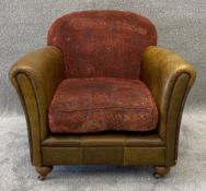 A Tetrad club armchair in leather and cut velour upholstery. H.83 W.86 D.101cm