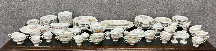 A large Rosenthal hand painted bone china tea service with a floral design. Eight dinner plates etc.