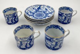 A set of four 19th century coffee cans and saucers with Chinese dragon motifs. Dia.14cm (largest)
