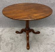 A Georgian tilt top occasional table with birdcage action, possibly sycamore. H.76 Dia.92cm