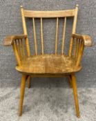 A mid-century beech and elm stick back armchair. H.86 W.58 D.48cm