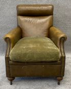 A Tetrad armchair in a Howard style upholstered in leather. H.93 W.73 D.91cm