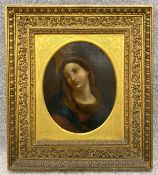 A 19th century oil on canvas, portrait of Saint Mary Magdalene in the manner of Carlo Dolci. H.61