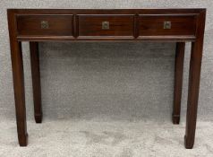A Chinese hardwood console table fitted with frieze drawers. H.90 W.115 D.40cm