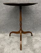 A 19th century mahogany lamp or occasional table with tilt top action on tripod base. H.70 Dia.55cm