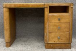 An Art Deco walnut pedestal desk fitted with slide-out pigeon hole. H.76 W.114 D.55cm