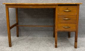 A mid century teak M. Margolis Ltd. desk with maker's label. H.77 W.123 D.62cm
