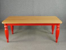 A Benchmark kitchen dining table, contemporary in a traditional style, light oak with painted