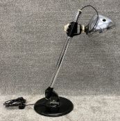 A large Joseph Lucas Ltd. early/mid 20th century industrial steel desk lamp with adjustable height