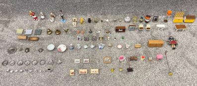 An extensive collection of doll's house furniture and household items, some brand new pieces.