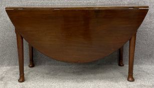 A mid Georgian Cuban mahogany drop flap dining table with gateleg action. H.75 W.55 (156 extended)