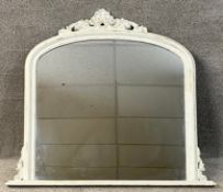 A contemporary white painted moulded overmantle mirror in the Victorian style. H.100 W.114cm