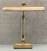 A mid century Linora Spotline industrial style articulated metal table/desk lamp. H.62cm