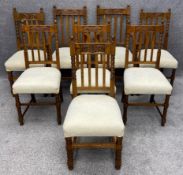 A matched set of eight mid century carved oak Carolean style dining chairs to include two carver