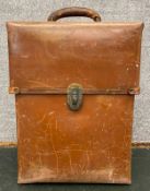 A vintage Charles King Ltd. nitrous oxide breathing apparatus and tank in a leather carry case. H.