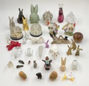 A large and miscellaneous collection of rabbit figures to include two resin and one boxwood signed