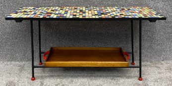 A mid century Hemo coffee table with a multi coloured mosaic tiled top and a removable teak tray