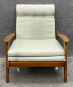 A mid century teak framed armchair with reclining and foldaway action. H.84 W.70 D.85cm