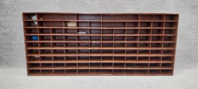 A large vintage teak bank of open pigeon holes. H.82 W.192.5 D.21cm