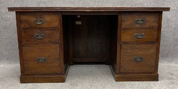 A contemporary teak 19th century Colonial style pedestal desk by Lombok, with maker's label. H.76