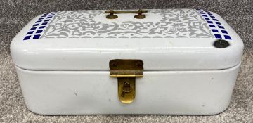 A vintage German metal enamel bread box with brass handles and hinges. H.17 W.46 D.26cm